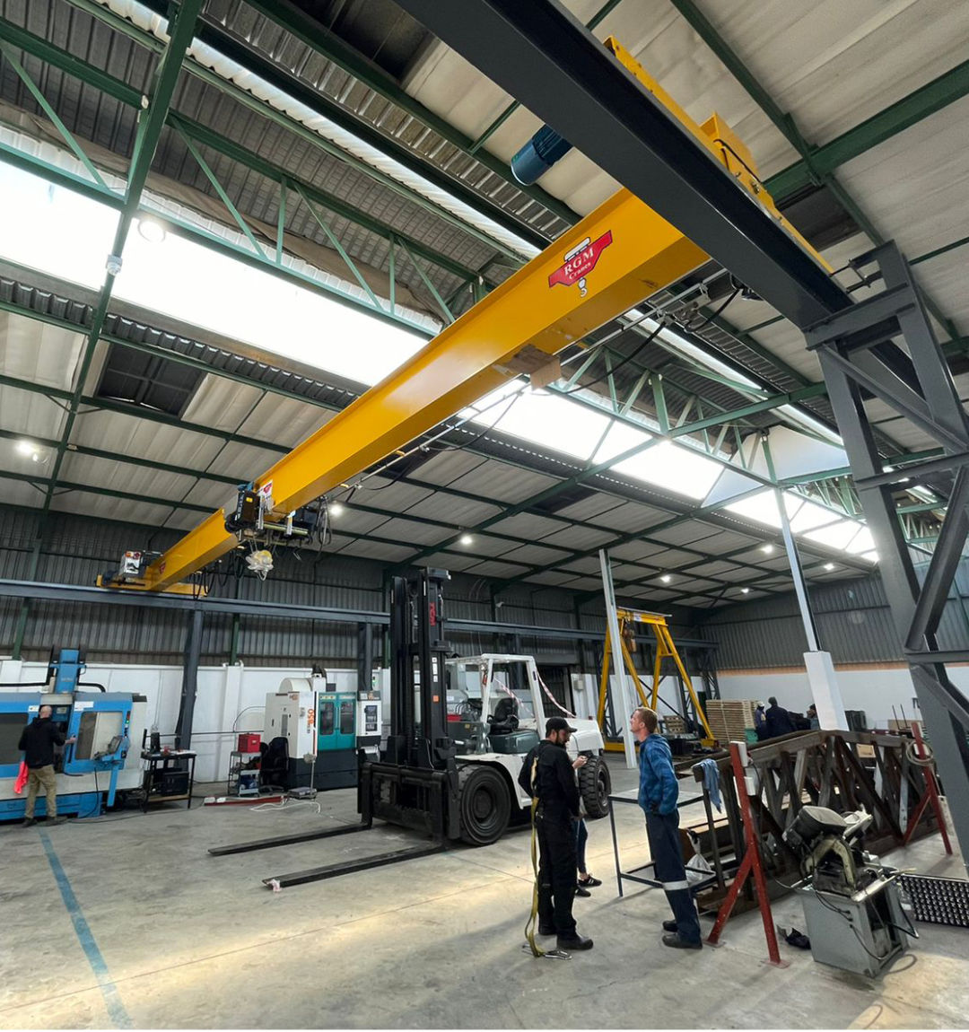 Tool room with employees and machinery